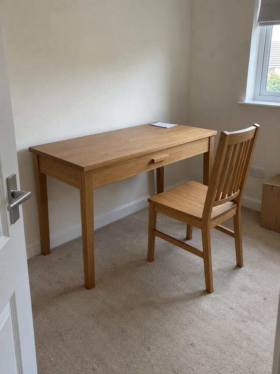 Photograph: our oak office desk with one drawer and a slat-back oak chair